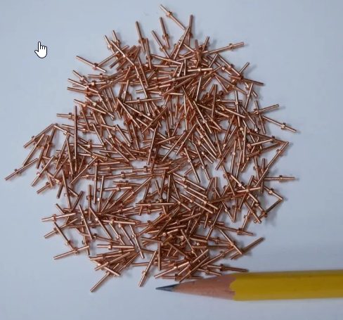Copper precision pins with pencil for scale – Chesapeake CNC