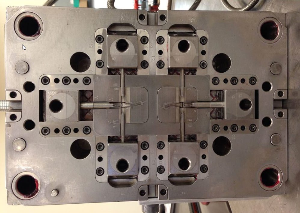 MIM mold tooling and die plate — Parmatech production