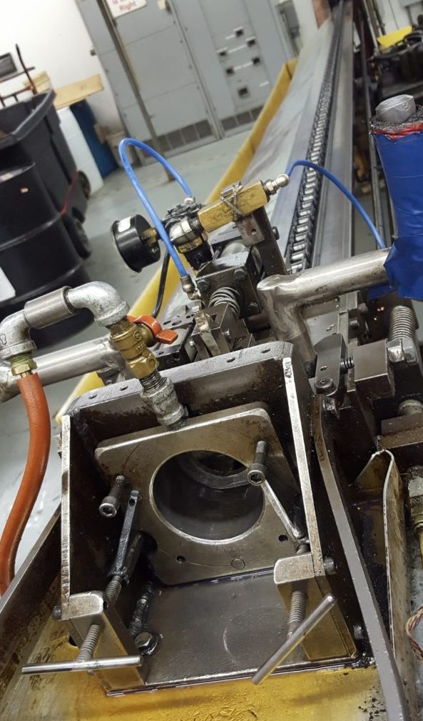 CNC machining station with precision tube setup — aerospace manufacturing